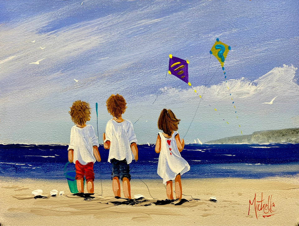 Flying Kites By The Seaside