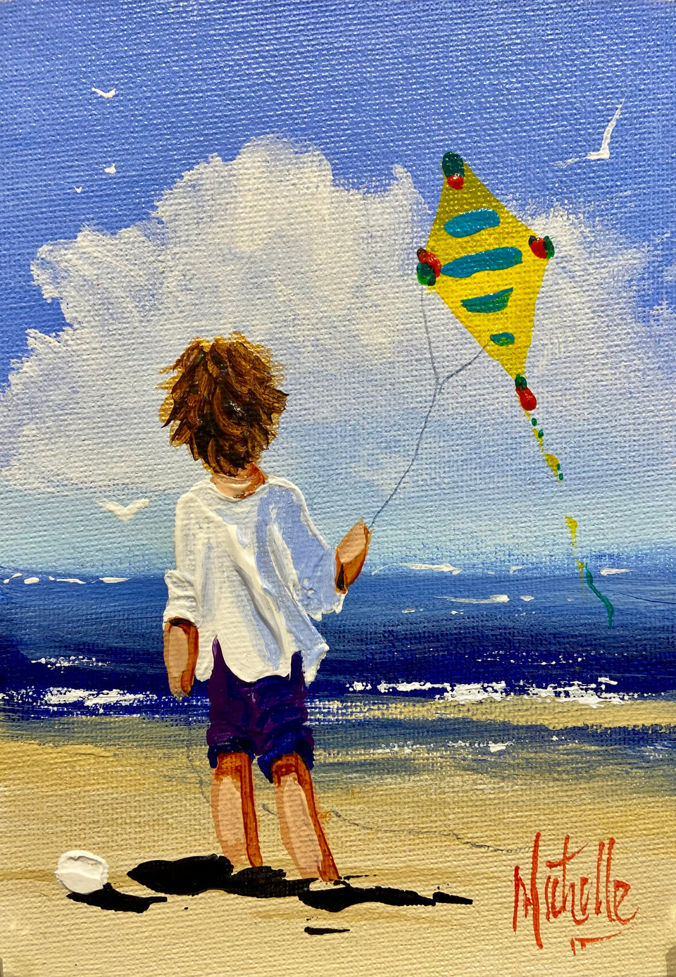 Young Boy Flying His Yellow Kite