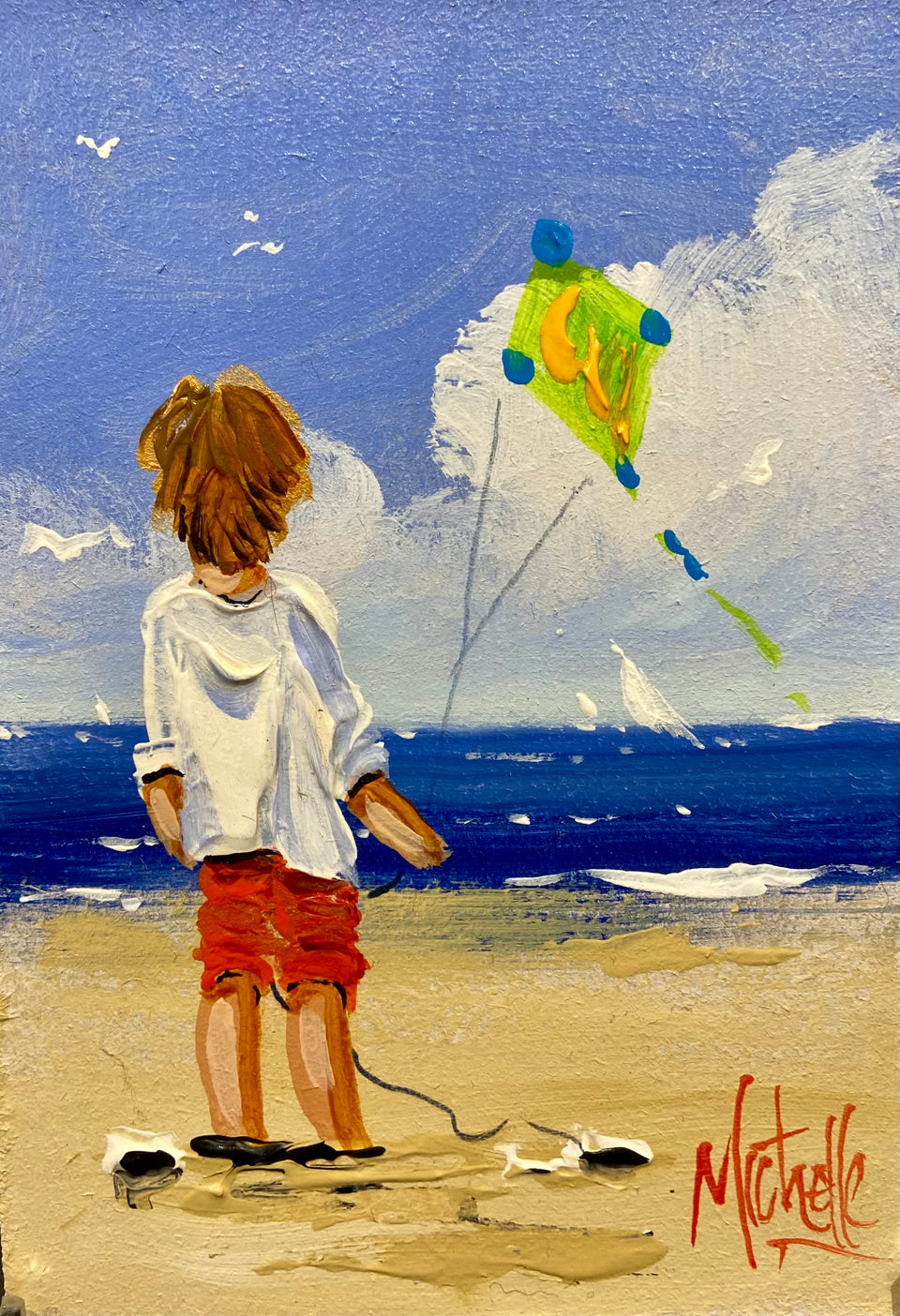 Young Boy Flying His Green Kite