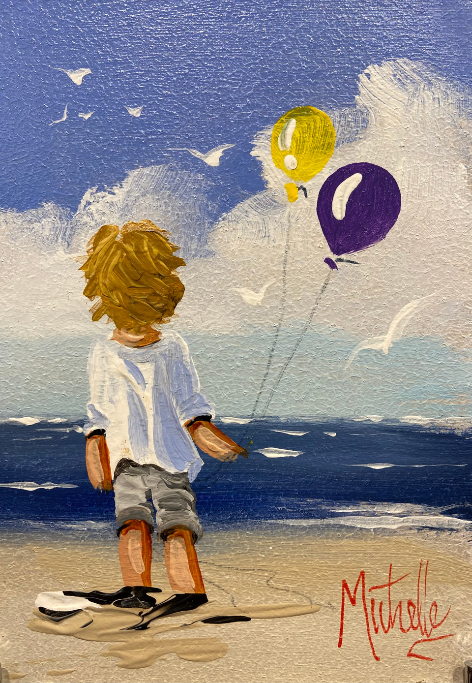 Young Boy Flying Balloons